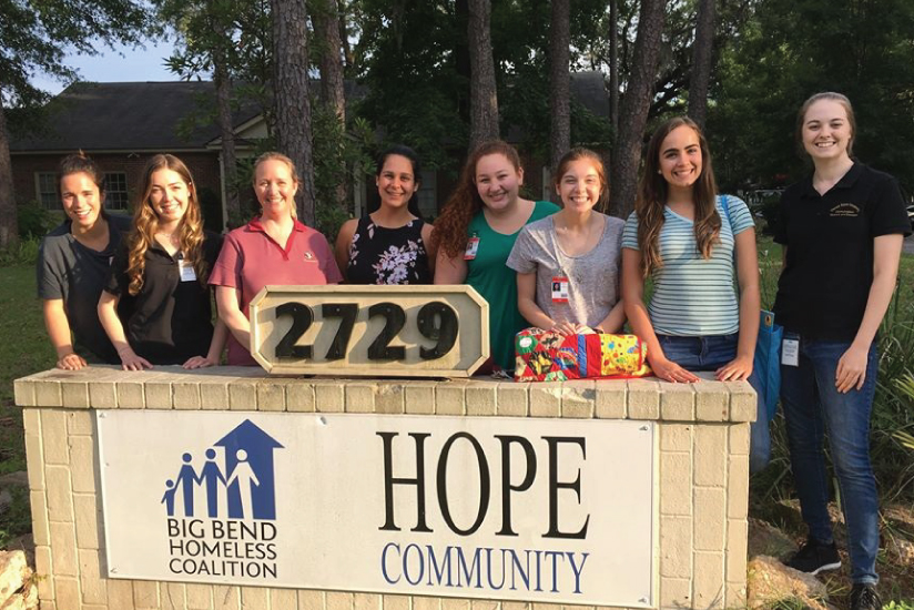 Students with Dr. Hall-Mills at HOPE Community Center